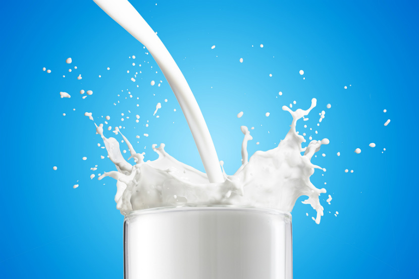 Calcium-rich milk being poured into a glass