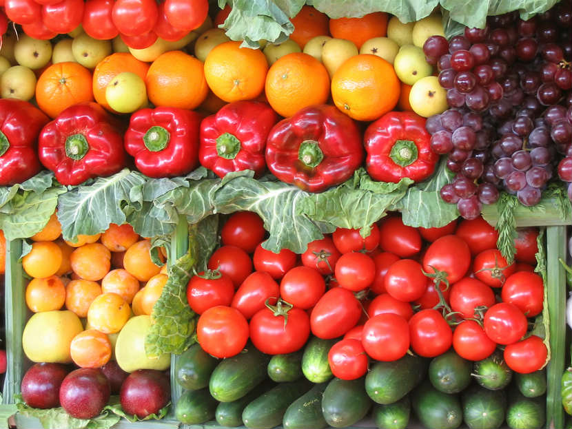 colourful fruit and vegetables like red peppers, organges and grapes