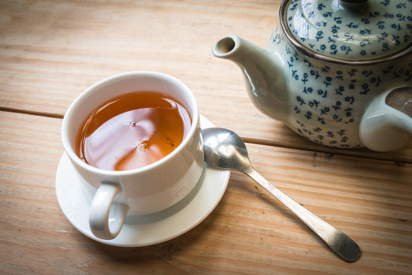 tea pot and cup of black tea