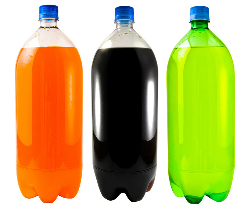 bottle of orange pop, bottle of cola, bottle of clear soda