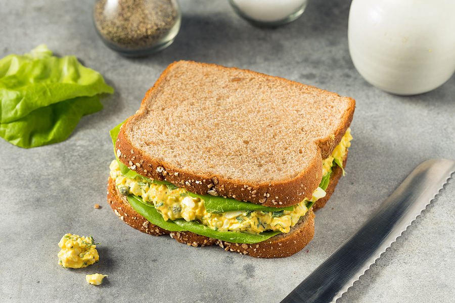 healthy sandwich with egg and vegetables and whole wheat bread